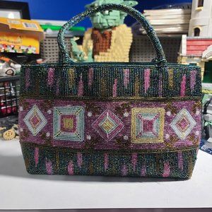 Fully beaded handbag with top handle